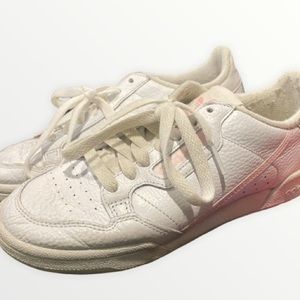 Pink adidas continentals